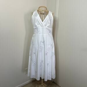 beautiful white dress with embroidered floral patches